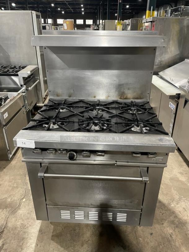 Garland Commercial Natural Gas Powered 6 Burner Range! With Full Sized Oven Underneath! With Back Splash & Overhead Salamander Shelf! All Stainless Steel! On Legs! - Image 1 of 9