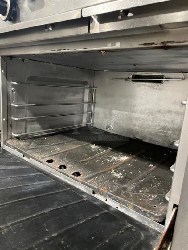 Garland Commercial Natural Gas Powered 6 Burner Range! With Full Sized Oven Underneath! With Back Splash & Overhead Salamander Shelf! All Stainless Steel! On Legs! - Image 8 of 9