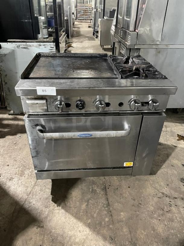 Cook Rite Commercial Natural Gas Powered 2 Burner Range Split Top With Flat Griddle! With Full Sized Oven Underneath! With Back Splash & Overhead Salamander Shelf! All Stainless Steel! On Casters! - Image 1 of 13