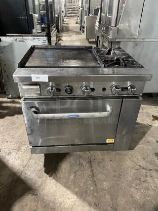 Cook Rite Commercial Natural Gas Powered 2 Burner Range Split Top With Flat Griddle! With Full Sized Oven Underneath! With Back Splash & Overhead Salamander Shelf! All Stainless Steel! On Casters!