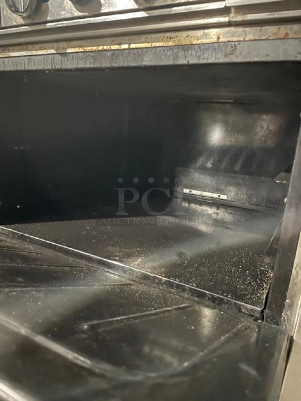 Cook Rite Commercial Natural Gas Powered 2 Burner Range Split Top With Flat Griddle! With Full Sized Oven Underneath! With Back Splash & Overhead Salamander Shelf! All Stainless Steel! On Casters! - Image 8 of 13