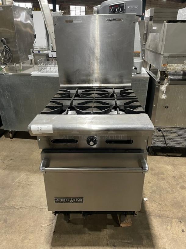 American Range Commercial Natural Gas Powered 4 Burner Stove! With Full Sized Oven Underneath! With Backsplash! All Stainless Steel!  With Metal Oven Rack! On Legs! - Image 1 of 9