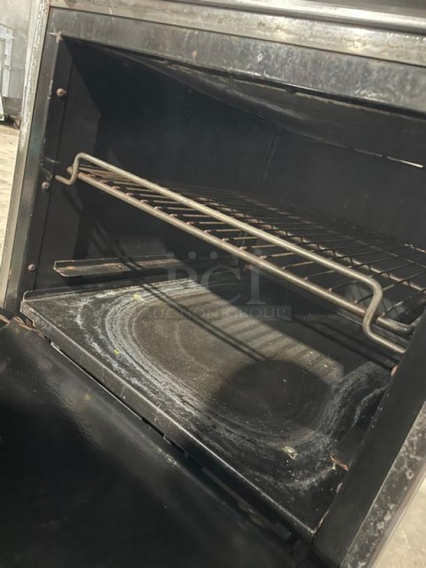 Commercial Natural Gas Powered 4 Burner Range! With Full Sized Oven Underneath! With Back Splash! All Stainless Steel! With Metal Oven Rack! Working When Removed! - Image 7 of 9