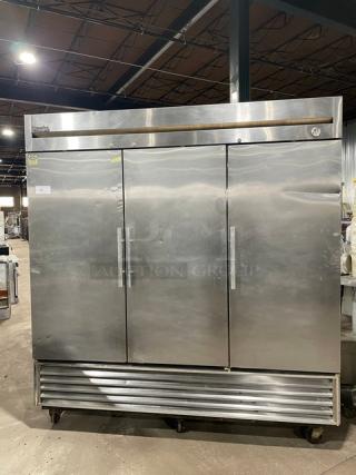 True Commercial 3 Door Reach In Refrigerator! All Stainless Steel! With Poly Coated Racks! On Casters! 115V 1 Phase! Model: T-72 SN:1-2432016! Working When Removed!