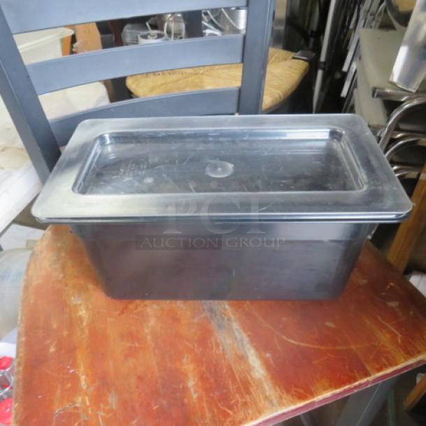 One 1/3 Size 6 Inch Deep Black Food Storage Container With Clear Lid. - Image 1 of 1