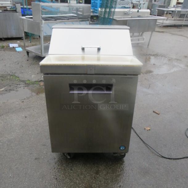 One Hoshizaki 1 Door Refrigerated Prep Table With Cutting Board And 1 Rack On Casters. Model# CRMR27-8. 115 Volt. 27X4X44.5. $3374.00. - Image 1 of 1
