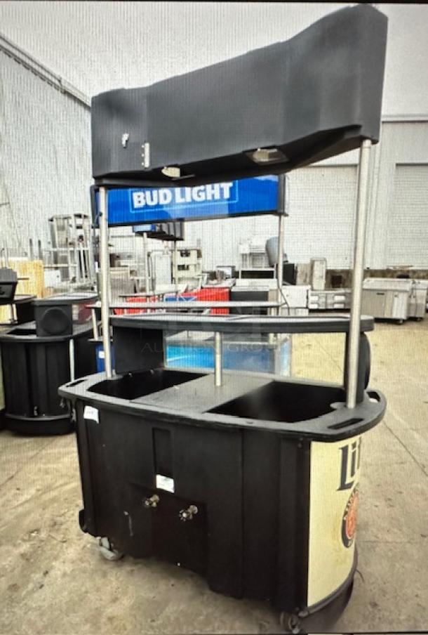 One IRP Miller Lite Kiosk On Casters. 60.5X30.5X90 - Image 1 of 2