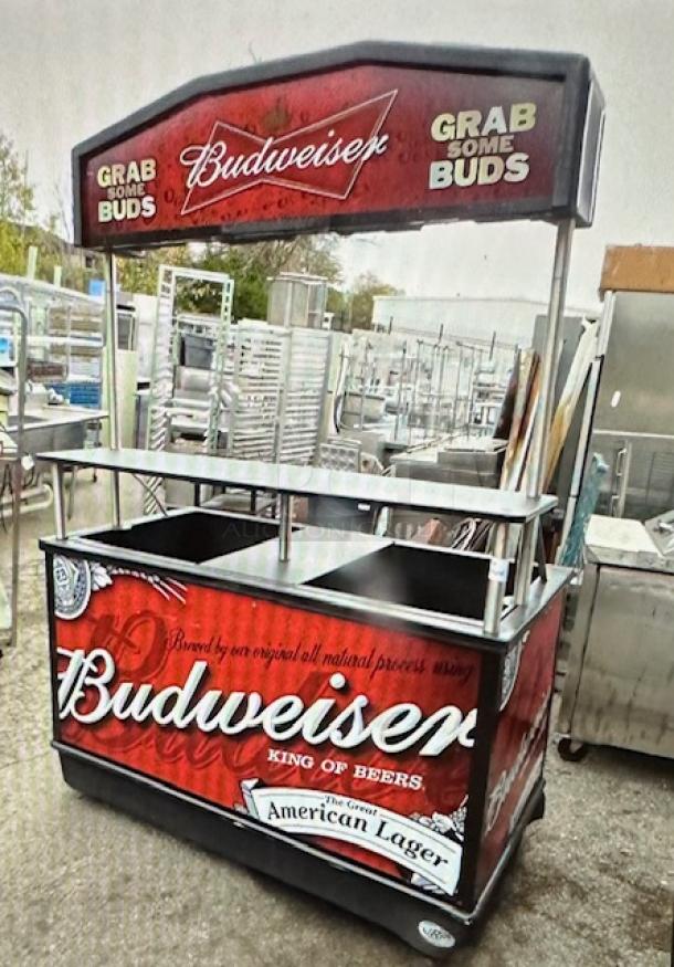 One IRP Budweiser Kiosk With Under Storage On Casters. 61.5X30.5X87 - Image 1 of 2
