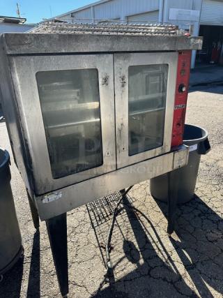 One Vulcan Full Size Electric Convection Oven With 5 Racks. 40.5X31X57
