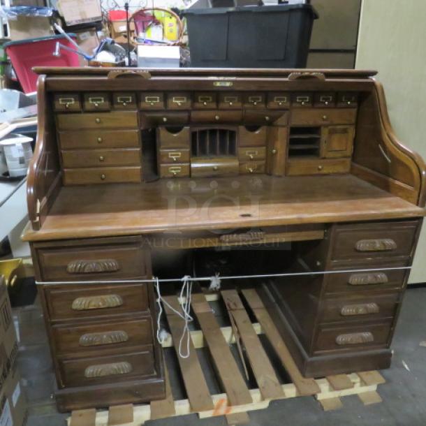 On  e Solid Oak Roll Top Desk With Multiple Drawers. Small Crack See Pics. 61X36X51 - Image 1 of 4