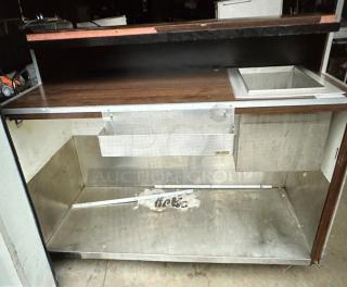 One Kiosk With One Ice Well, And Under Storage On Casters. 60.5X28.5X49