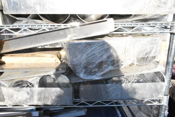 Chrome Finish Wire Shelving Unit on Commercial Casters w/ Contents Including Various Racks, Faucets, Metal.  BUYER MUST DISMANTLE. PCI CANNOT DISMANTLE FOR SHIPPING. PLEASE CONSIDER FREIGHT CHARGES. - Image 7 of 18