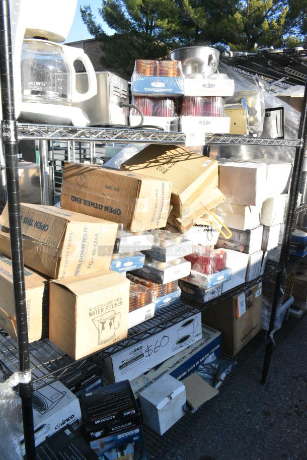 Chrome Finish 3 Tier Wire Shelving Unit w/ Contents Including Coffee Machine, Scale, Martini Glasses, 2 Tier Coffee Pot Warmer, Hollowick Votives, Water Pitchers.  BUYER MUST DISMANTLE. PCI CANNOT DISMANTLE FOR SHIPPING. PLEASE CONSIDER FREIGHT CHARGES. - Image 1 of 15