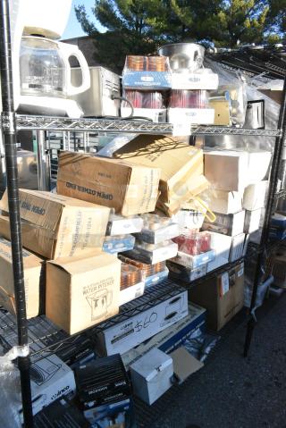 Chrome Finish 3 Tier Wire Shelving Unit w/ Contents Including Coffee Machine, Scale, Martini Glasses, 2 Tier Coffee Pot Warmer, Hollowick Votives, Water Pitchers.  BUYER MUST DISMANTLE. PCI CANNOT DISMANTLE FOR SHIPPING. PLEASE CONSIDER FREIGHT CHARGES.
