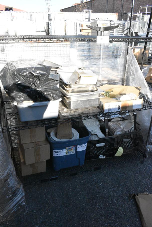 Chrome and Black Finish 3 Tier Wire Shelving Unit w/ Contents Including TableCraft Cake Trays, Ceramic Dishes, Stainless Steel Drop In Bins.  BUYER MUST DISMANTLE. PCI CANNOT DISMANTLE FOR SHIPPING. PLEASE CONSIDER FREIGHT CHARGES. - Image 1 of 7