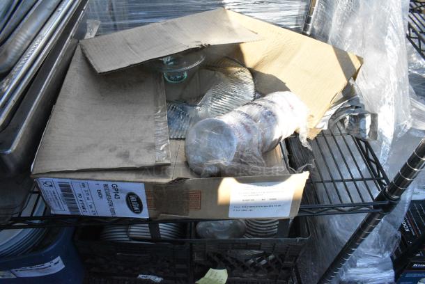 Chrome and Black Finish 3 Tier Wire Shelving Unit w/ Contents Including TableCraft Cake Trays, Ceramic Dishes, Stainless Steel Drop In Bins.  BUYER MUST DISMANTLE. PCI CANNOT DISMANTLE FOR SHIPPING. PLEASE CONSIDER FREIGHT CHARGES. - Image 2 of 7