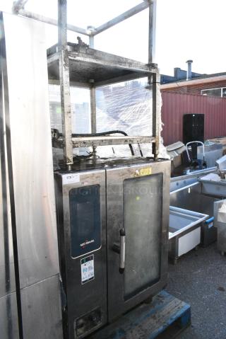 2019 Alto Shaam CTP10-10E Stainless Steel Commercial Electric Powered Combi Convection Oven w/ Equipment Stand. 208-240 Volts, 3 Phase.