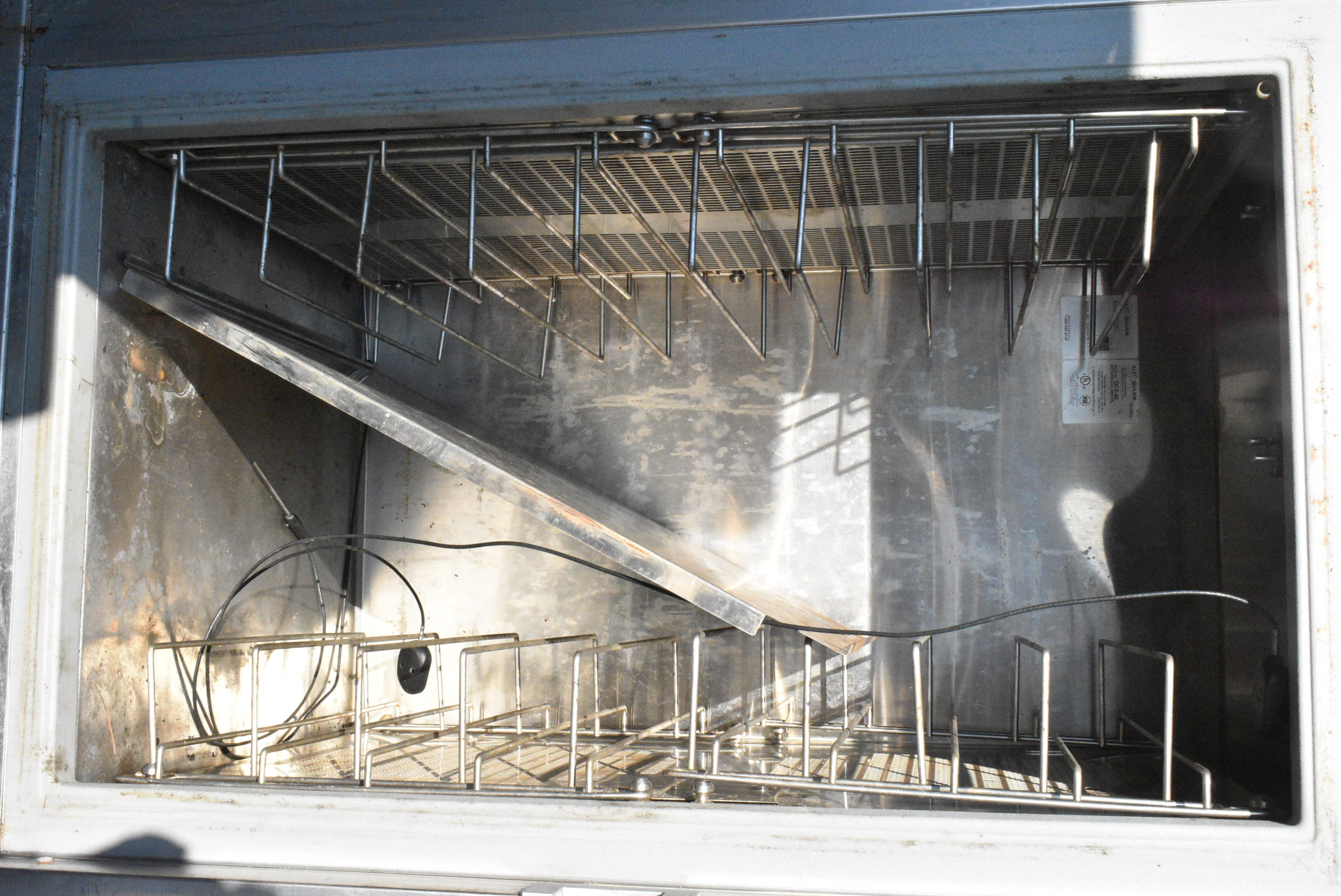 Used blast chiller interior showing wear but serviceable condition