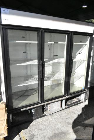 True GDM-72 Metal Commercial 3 Door Reach In Cooler Merchandiser w/ Poly Coated Racks. 115 Volts, 1 Phase. Tested and Working!