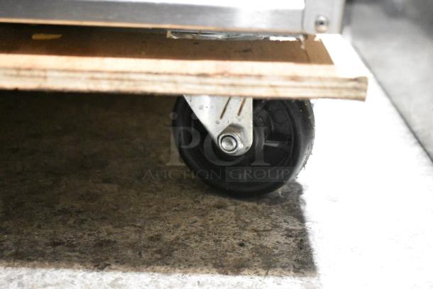 BRAND NEW SCRATCH AND DENT! 2022 KoolMore RIR-1D-SS-19C Stainless Steel Commercial Single Door Reach In Cooler w/ Poly Coated Racks on Commercial Casters. See Top Corner For Damage. 115 Volts, 1 Phase. Tested and Powers On But Does Not Get Cold - Image 3 of 6