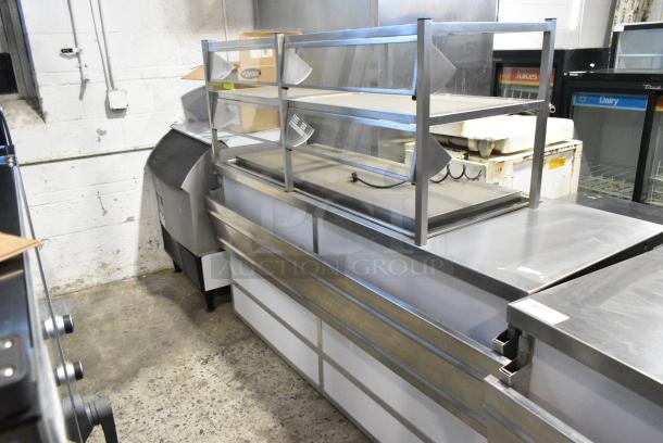 BRAND NEW SCRATCH AND DENT!  Atlas Metal Industries DDC-4 Stainless Steel Commercial Buffet Station w/ 2 Tier Over Shelf and Tray Slide on Commercial Casters. Tested and Working! - Image 1 of 8