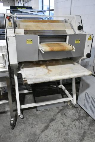 Empire FB Metal Commercial Floor Style Moulder on Commercial Casters. 220 Volts.