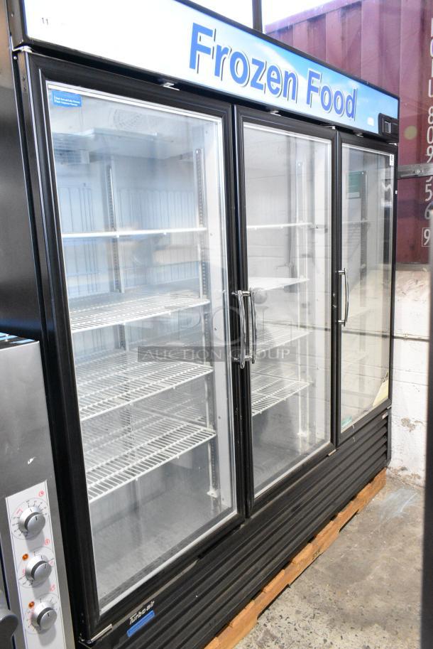BRAND NEW SCRATCH AND DENT! Turbo Air TGF-72FB-N Metal Commercial 3 Door Reach In Freezer Merchandiser w/ Poly Coated Racks. 110-120 Volts, 1 Phase. Tested and Working! - Image 2 of 7