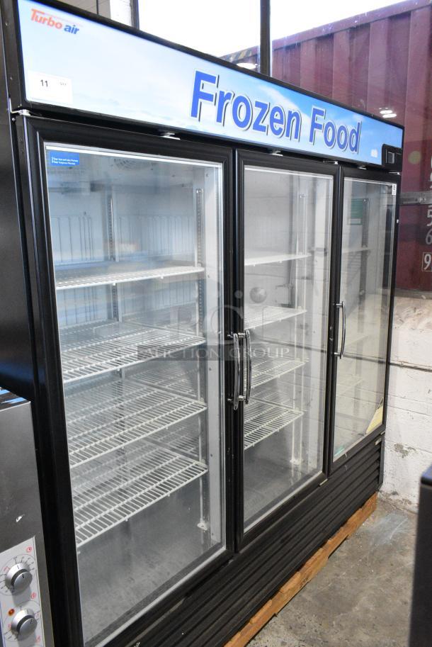 BRAND NEW SCRATCH AND DENT! Turbo Air TGF-72FB-N Metal Commercial 3 Door Reach In Freezer Merchandiser w/ Poly Coated Racks. 110-120 Volts, 1 Phase. Tested and Working! - Image 3 of 7