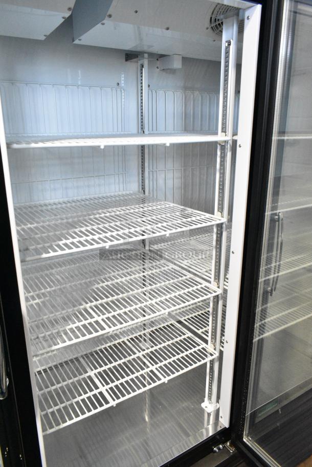 BRAND NEW SCRATCH AND DENT! Turbo Air TGF-72FB-N Metal Commercial 3 Door Reach In Freezer Merchandiser w/ Poly Coated Racks. 110-120 Volts, 1 Phase. Tested and Working! - Image 5 of 7