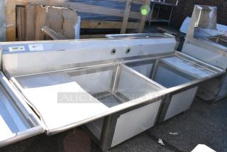 BRAND NEW SCRATCH AND DENT! Regency 600SS22424218 Stainless Steel 2 Bay Sink w/ Dual Drain Boards. No Legs. Bays 24x24x14. Drain Boards 16x25