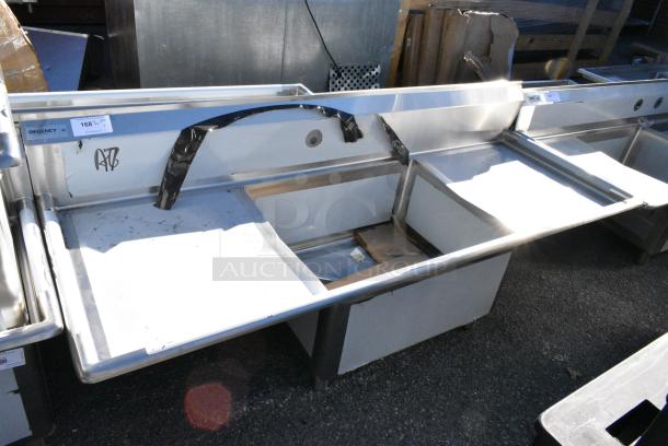 BRAND NEW SCRATCH AND DENT! Regency Spec Line Stainless Steel Single Bay Sink w/ Dual Drain Boards. No Legs. Bay 30x24x14. Drain Boards 22x25 - Image 1 of 6