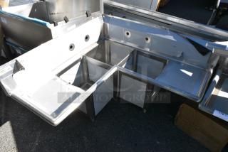 BRAND NEW SCRATCH AND DENT! Regency 600S3141414C 44 1/2" 16 Gauge Stainless Steel Three Compartment Commercial Corner Sink with Two Drainboards - 14" x 14" x 14" Bowls