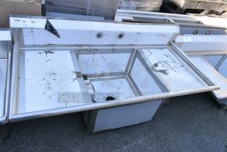 BRAND NEW SCRATCH AND DENT! Regency 600S12424218 Stainless Steel Single Bay Sink w/ Dual Drain Board. No Legs. Bays 60x28x26.5. Drain Board 16x25