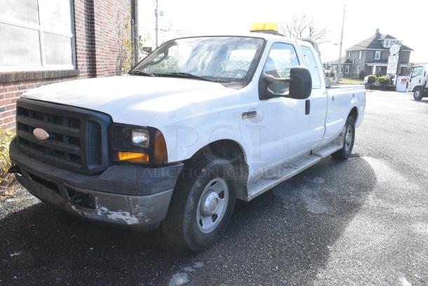 2006 Ford F250 Super Duty 2WD Pick Up Truck w/ Crew Cab, Headache Guard and Tommy Gate PUW60-1340S38TP4 liftgate. VIN 1FTSX20566ED68092. Title In Hand. Needs a Timing Chain. Vehicle Runs and Drives But Needs a New Battery; Will Need To Be Jump Started. - Image 1 of 12