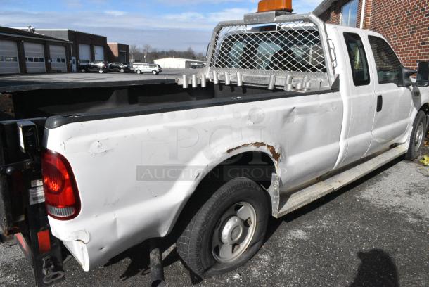 2006 Ford F250 Super Duty 2WD Pick Up Truck w/ Crew Cab, Headache Guard and Tommy Gate PUW60-1340S38TP4 liftgate. VIN 1FTSX20566ED68092. Title In Hand. Needs a Timing Chain. Vehicle Runs and Drives But Needs a New Battery; Will Need To Be Jump Started. - Image 6 of 12