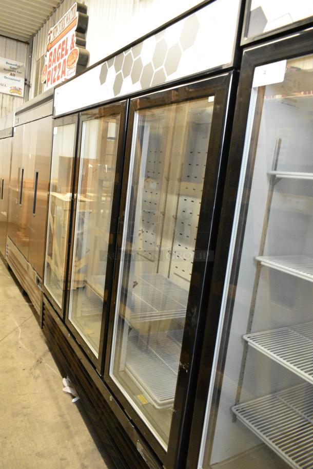 BRAND NEW SCRATCH AND DENT!  2023 Migali C-72FM Metal Commercial 3 Door Reach In Freezer Merchandiser w/ Poly Coated Racks on Commercial Casters. 115/208-230 Volts, 1 Phase. - Image 2 of 9
