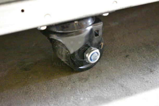 BRAND NEW SCRATCH AND DENT!  2023 Migali C-72FM Metal Commercial 3 Door Reach In Freezer Merchandiser w/ Poly Coated Racks on Commercial Casters. 115/208-230 Volts, 1 Phase. - Image 9 of 9