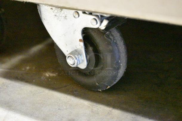 BRAND NEW SCRATCH AND DENT! 2019 Migali C-2F-HC Stainless Steel Commercial 2 Door Reach In Freezer w/ Poly Coated Racks on Commercial Casters. 115/208-230 Volts, 1 Phase. - Image 5 of 6