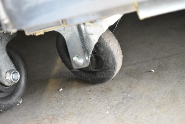 BRAND NEW SCRATCH AND DENT! 2023 Migali C-1R-HC Stainless Steel Commercial Single Door Reach In Cooler w/ Poly Coated Racks on Commercial Casters. 115 Volts, 1 Phase. Tested and Working! - Image 4 of 6