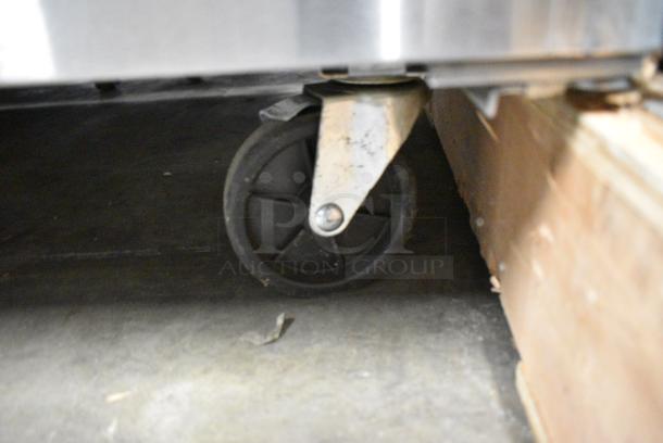 BRAND NEW SCRATCH AND DENT! 2018 Migali C-U48F-HC Stainless Steel Commercial 2 Door Undercounter Cooler on Commercial Casters. 115 Volts, 1 Phase. Tested and Working! - Image 6 of 9