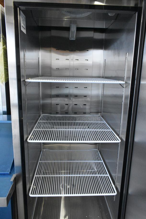 BRAND NEW SCRATCH AND DENT! 2018 Migali C-1FB-HC Stainless Steel Commercial Single Door Reach In Freezer w/ Poly Coated Racks on Commercial Casters. 115 Volts, 1 Phase. Tested and Powers On But Does Not Get Cold - Image 4 of 8