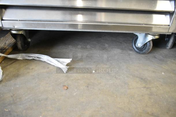 BRAND NEW SCRATCH AND DENT! 2018 Migali C-1FB-HC Stainless Steel Commercial Single Door Reach In Freezer w/ Poly Coated Racks on Commercial Casters. 115 Volts, 1 Phase. Tested and Powers On But Does Not Get Cold - Image 7 of 8