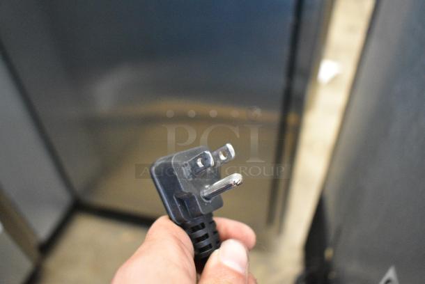 BRAND NEW SCRATCH AND DENT! 2018 Migali C-1FB-HC Stainless Steel Commercial Single Door Reach In Freezer w/ Poly Coated Racks on Commercial Casters. 115 Volts, 1 Phase. Tested and Powers On But Does Not Get Cold - Image 8 of 8