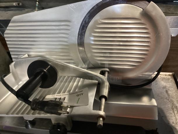 Globe Chefmate Meat Slicer 
Model# C10 - Image 1 of 2