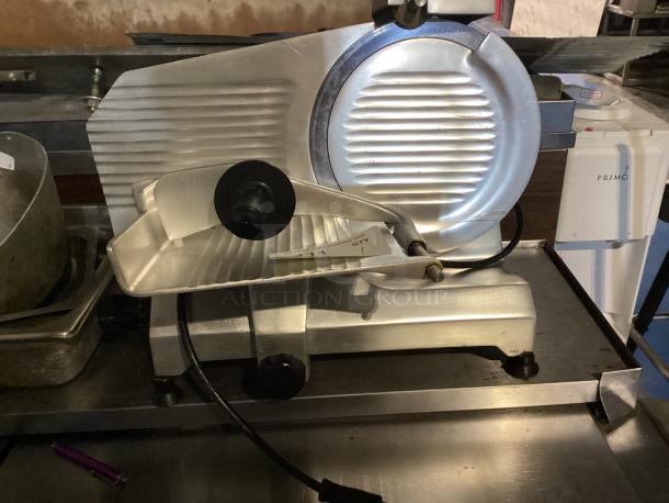 Globe Chefmate Meat Slicer 
Model# C10 - Image 2 of 2
