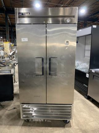 True Commercial 2 Door Reach In Freezer! All Stainless Steel! With Poly Coated Racks! On Casters! 115V 1 Phase! Model: T-35F SN: 1-4109680!