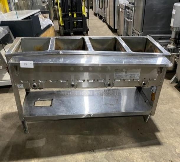 Duke Commercial Stainless Steel Natural Gas Powered 4 Well Hot Food/Steam Table! With Pan Rail! With Single Shelf Stand! On Legs! Model: 304 M SN: 06162325! - Image 1 of 9