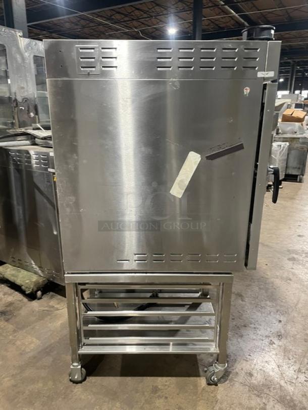 LATE MODEL! 2020! Alto Shaam Commercial Electric Powered Half Size Multi-Cook Oven! With 4 Cooking Chamber Zones! With Individual Controls! On Storage Shelf With 5 Pan Holding Rack! All Stainless Steel! With Metal Oven Racks! On Casters! 208-240V 3 Phase! Model: VMC-H4H SN: 2694173-000! Working When Removed! - Image 3 of 9