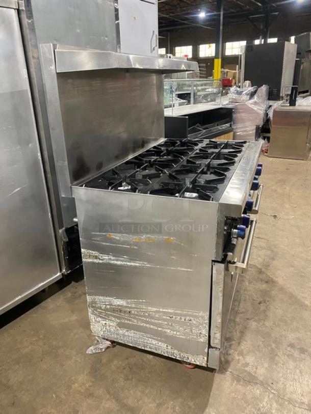Standard Range Commercial Stainless Steel Natural Gas Powered 8 Burner Range! With 2 Full Sized Ovens Underneath! With Back Splash & Overhead Salamander Shelf! With Metal Oven Rack! On Casters! - Image 2 of 10