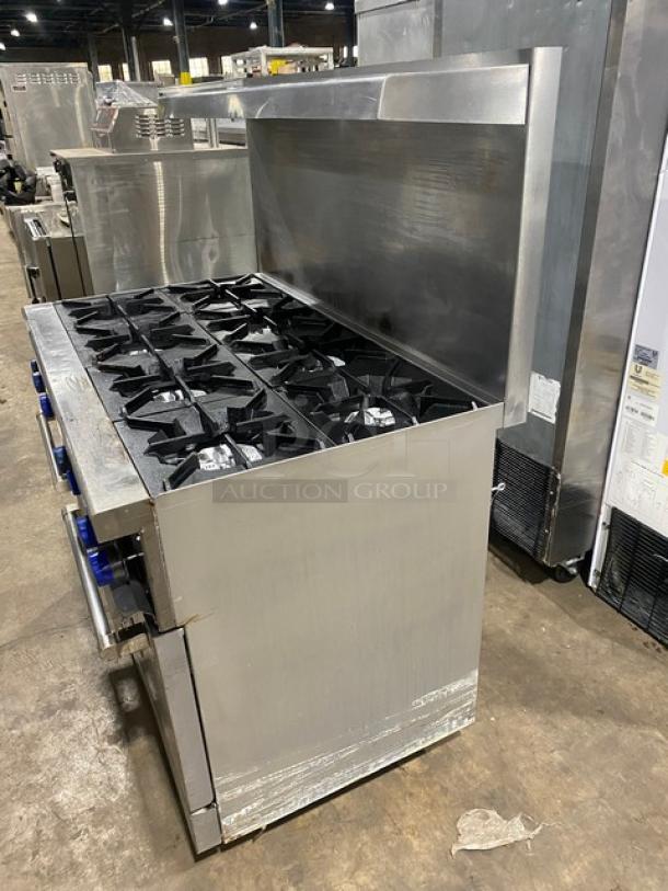 Standard Range Commercial Stainless Steel Natural Gas Powered 8 Burner Range! With 2 Full Sized Ovens Underneath! With Back Splash & Overhead Salamander Shelf! With Metal Oven Rack! On Casters! - Image 3 of 10